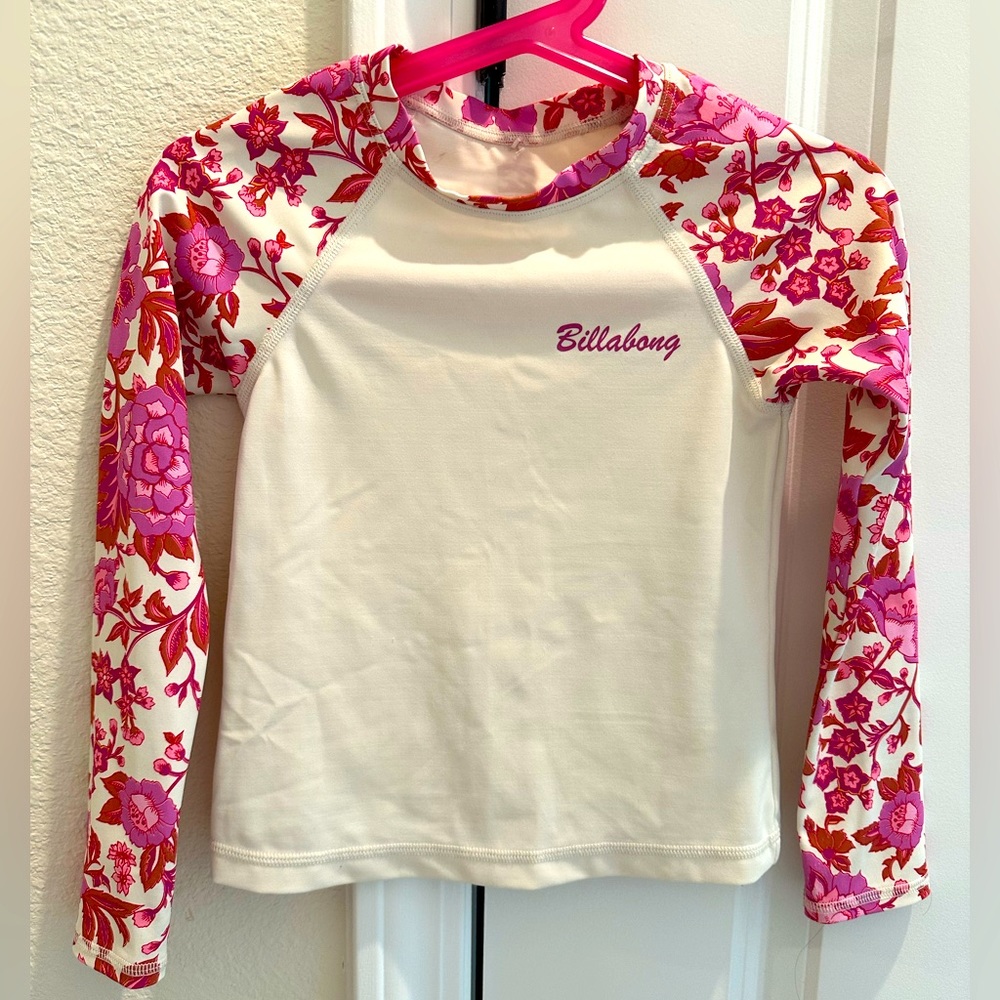 Billabong girls rashguard. Off white w/pink flowers and leaves on sleeves. Size6